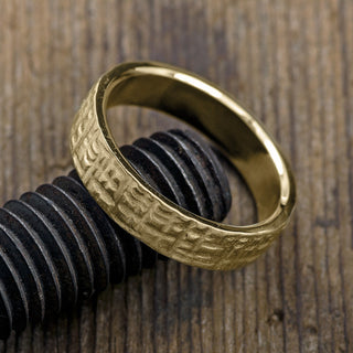 Side angle view of the 6mm 14k yellow gold men's wedding band, emphasizing the thickness and detailed texture