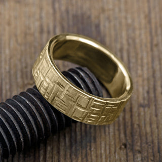 Aesthetic view of 8mm 14k yellow gold men's wedding band beautifully highlighting the matte finish