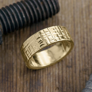 8mm 14k Yellow Gold Mens Wedding Band with textured design in a polished finish, frontal view