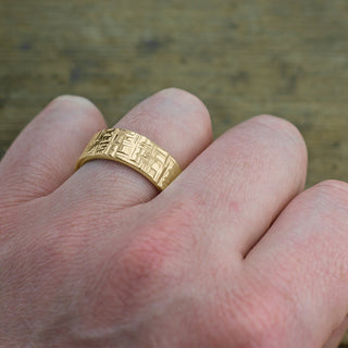 Side profile image of 8mm 14k Yellow Gold Mens Wedding Band, showcasing the Textured Polished design