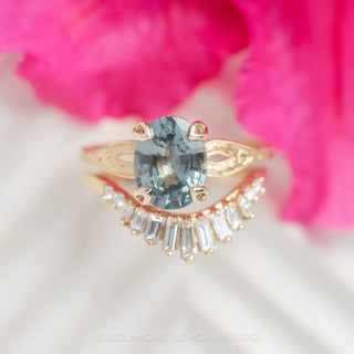 teal oval sapphire ring