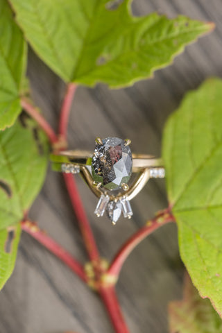 black oval diamond ring