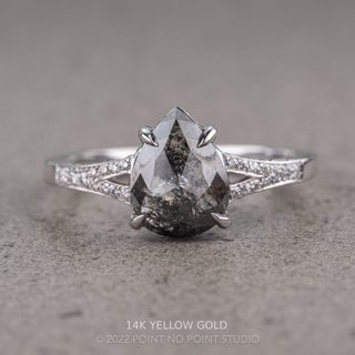 2.09 Carat Black Salt and Pepper Pear Diamond Engagement Ring, River Setting, Point No Point Studio. Available in a variety of metal types. Eco-friendly, Recycled Metals, Conflict Free.