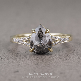 2.09 Carat Black Salt and Pepper Pear Diamond Engagement Ring, River Setting, Point No Point Studio. Available in a variety of metal types. Eco-friendly, Recycled Metals, Conflict Free.