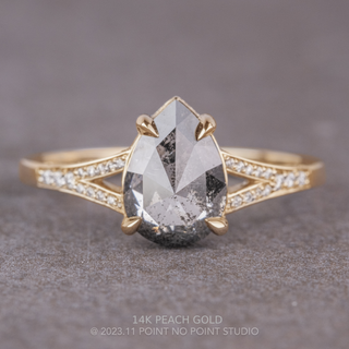 1.18 Carat Salt and Pepper Pear Diamond Engagement Ring, River Setting, Point No Point Studio. Available in a variety of metal types. Eco-friendly, Recycled Metals, Conflict Free.
