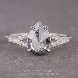 1.18 Carat Salt and Pepper Pear Diamond Engagement Ring, River Setting, Point No Point Studio. Available in a variety of metal types. Eco-friendly, Recycled Metals, Conflict Free.