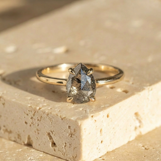 salt and pepper pear diamond ring
