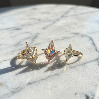 Kite Moissanite and Diamond Engagement Ring, Wren Setting, Point No Point Studio. Available in a variety of metal types. Eco-friendly, Recycled Metals, Conflict Free.