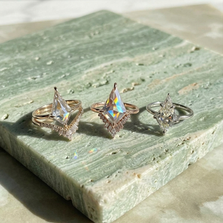 Kite Moissanite and Diamond Engagement Ring, Wren Setting, Point No Point Studio. Available in a variety of metal types. Eco-friendly, Recycled Metals, Conflict Free.