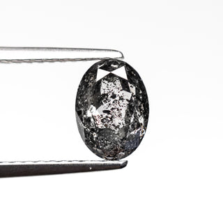 Black speckled oval diamond