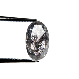 Black speckled oval diamond