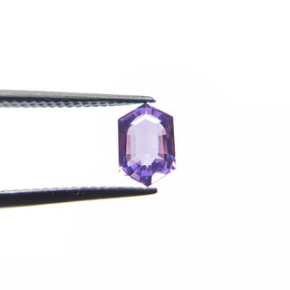 Elongated purple sapphire