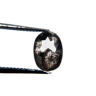 Salt and pepper oval diamond
