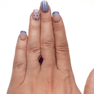 Purple lozenge shaped garnet