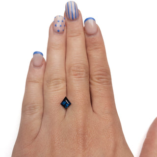 Dark blue kite shaped sapphire