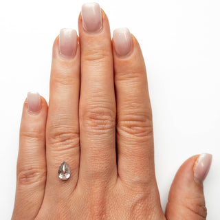 Icy white black speckled pear diamond