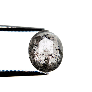 Black speckled oval diamond