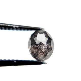 Salt and pepper oval diamond