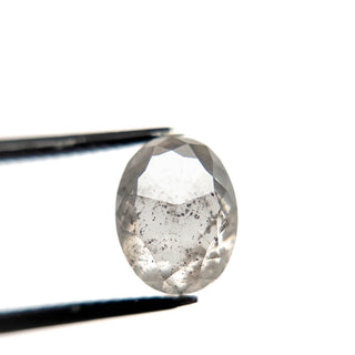 Icy salt and pepper oval diamond