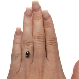Black speckled oval diamond