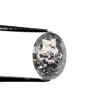 Black speckled oval diamond