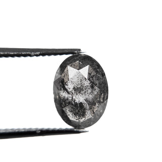 Black speckled oval diamond