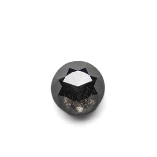1.23 Carat Black Salt and Pepper Double Cut Round Diamond showcasing unique speckled inclusions and handcrafted eco-friendly design, made in Washington state.