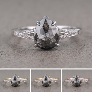 2.09 Carat Black Salt and Pepper Pear Diamond Engagement Ring, River Setting, Point No Point Studio. Available in a variety of metal types. Eco-friendly, Recycled Metals, Conflict Free.