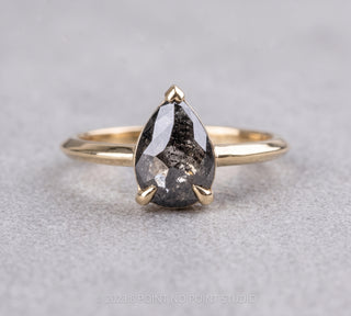 1.42 Carat Black Salt and Pepper Pear Diamond Engagement Ring, Charlize Setting, Point No Point Studio. Available in a variety of metal types. Eco-friendly, Recycled Metals, Conflict Free.