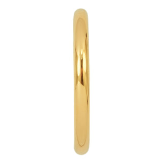 A detailed side-view of a 14k yellow gold half round wedding band, 2mm wide and 1.7mm thick, highlighting its polished finish