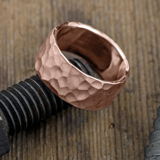 Angled perspective of 10mm 14k Rose Gold Mens Wedding Band, highlighting the Hammered Matte surface