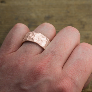 Side view of 10mm 14k Rose Gold Mens Wedding Band with a Hammered Matte finish