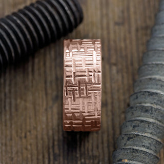 Angled view of 10mm Rose Gold Men's Textured Wedding Band