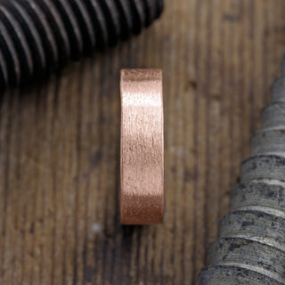 Detail angle view of 6mm 14K Rose Gold Men's Wedding Band with Matte Finish