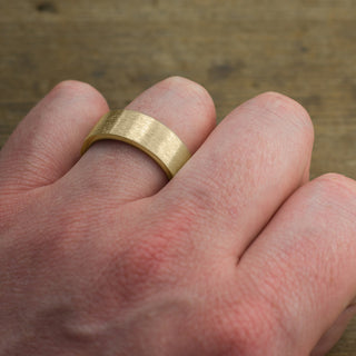 8mm 14k Yellow Gold Men's Wedding Band, Matte Finish, displayed at an angled perspective