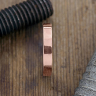 Premium 4mm Men's Wedding Ring made of 14k Rose Gold with a shiny appearance