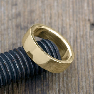 Angled view of the 6mm 14k Yellow Gold Mens Wedding Band, showcasing the polished design