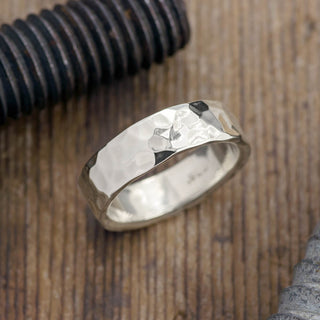 6mm 14k White Gold Mens Wedding Band with a Hammered Polished finish in close-up
