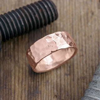 8mm 14k Rose Gold Hammered Mens Wedding Band with a high polished finish as seen from the top