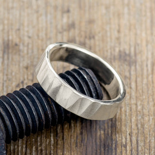 Close-up view of a 6mm 14k White Gold Men's Wedding Band, highlighting the Wood Grain Matte finish
