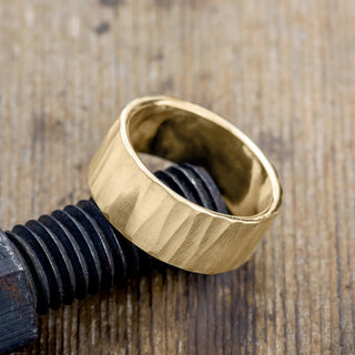 Full display of the 10mm 14k Yellow Gold Mens Wedding Band, showing off the wood grain matte finish