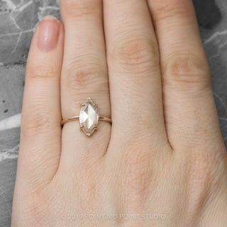 Elegant 14K rose gold engagement ring featuring 1.35 carat marquise cut diamond, Jane setting side view
