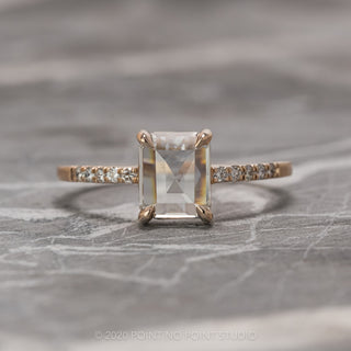Classic 1.55 carat clear emerald cut diamond engagement ring on a Jules setting in 14K rose gold