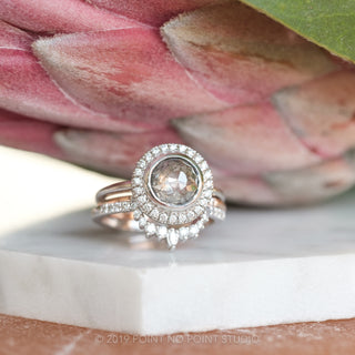 Handcrafted bezel halo engagement ring featuring 2.04 carat salt and pepper diamond, elegantly presented in 14k white gold.