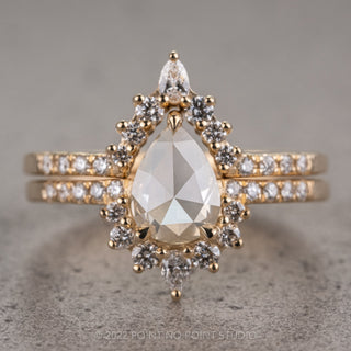 icy white pear diamond engagement ring