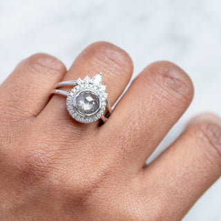 2.04 carat round salt and pepper diamond ring with 14k white gold bezel halo setting, top view showcasing unique speckled pattern.